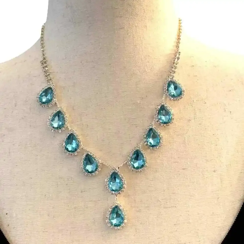Rhinestones and blue pear crystal necklace. 16” 3” extension. Lobster clasp‎